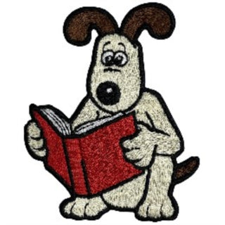 Supplemental image for 5060769432868 - Gromit Reading Sew On Patch