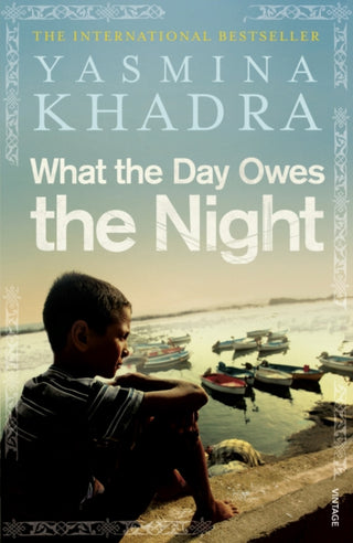 Cover image for 9780099540458 - What the Day Owes the Night